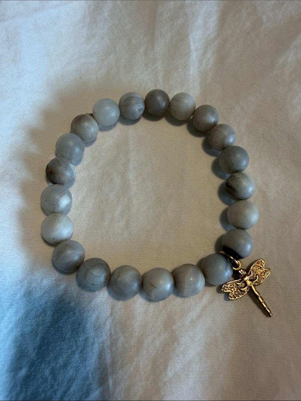 Gray Beaded Stretch Bracelet with Gold Dragonfly Charm